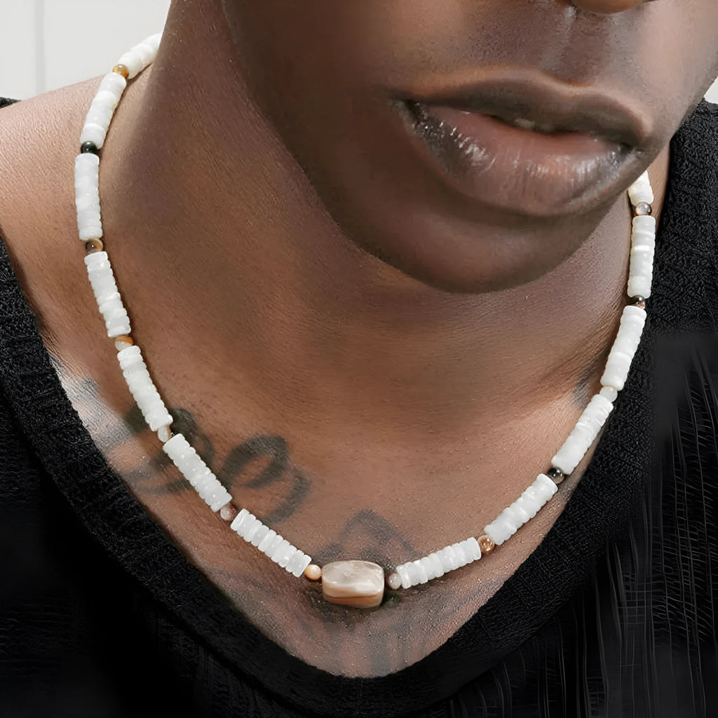 Men's vintage white shell necklace with round bead chain on neutral background
