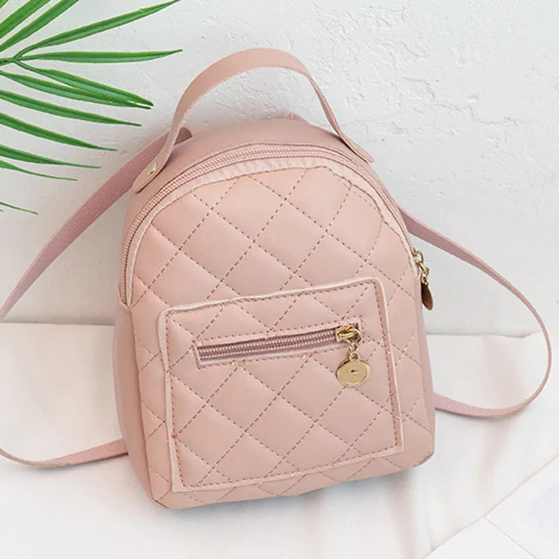 Girls' hard shell backpack with embroidery in black, pink, or white colours showing square shape and sandwich pocket