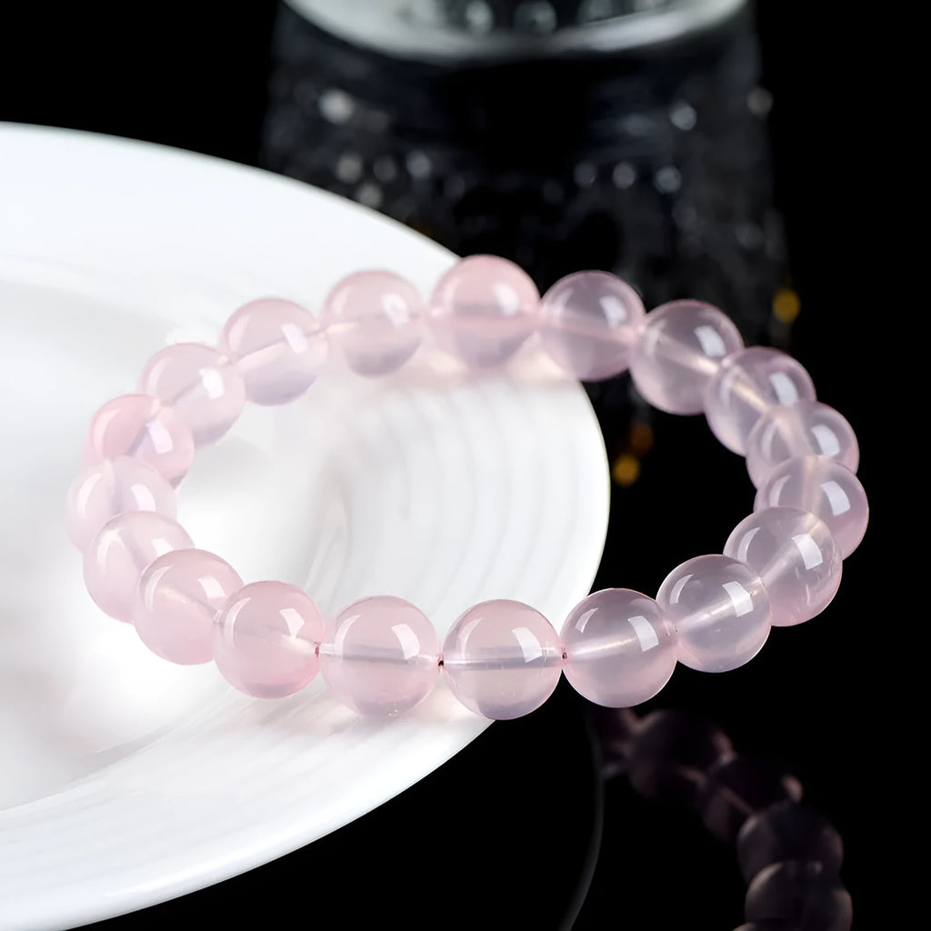Natural starlight crystal round beads bracelet in pink with polished finish