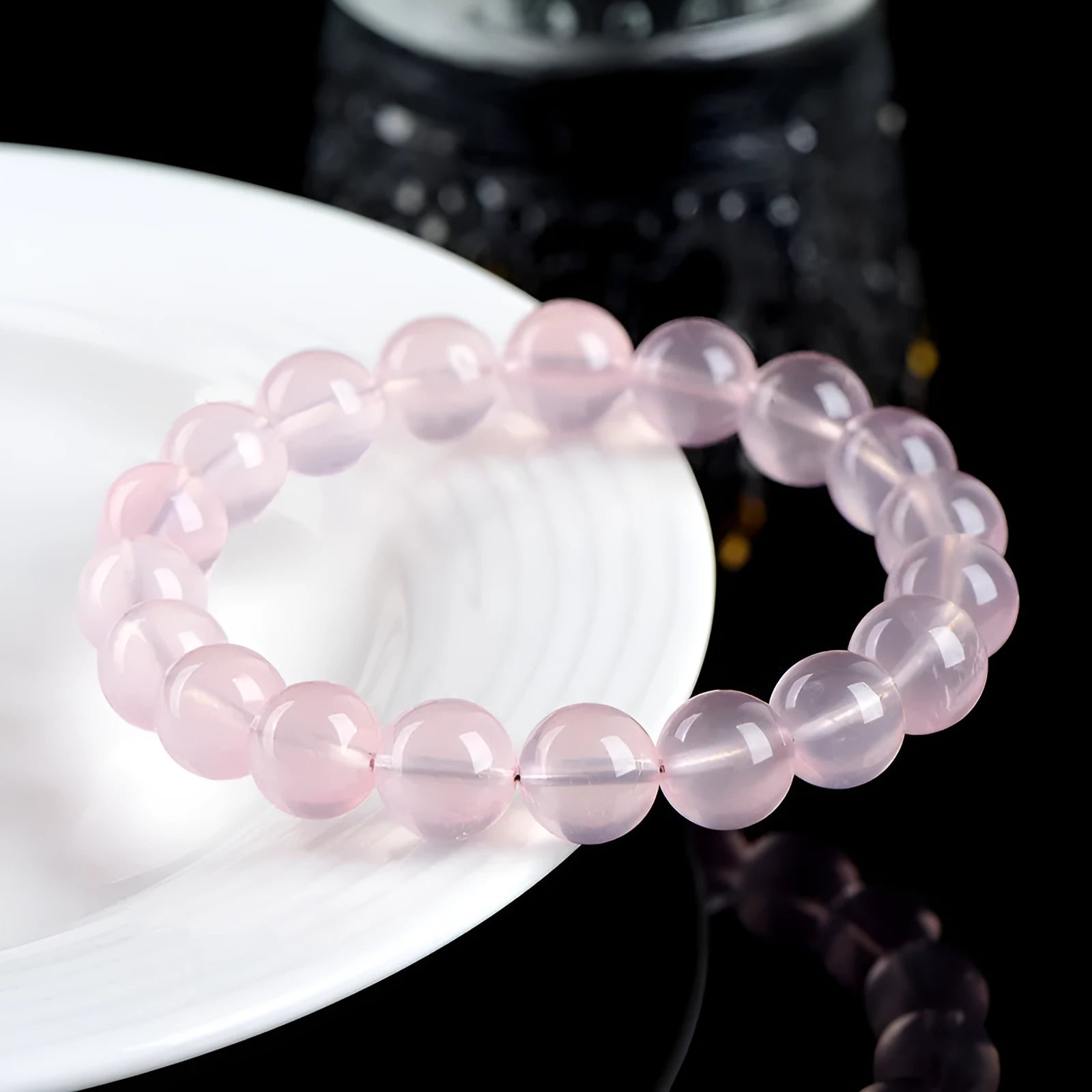 Natural starlight crystal round beads bracelet in pink with polished finish