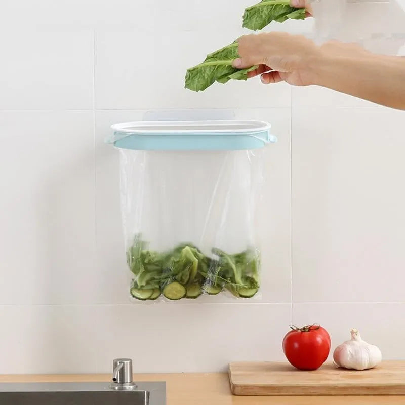 Blue plastic kitchen garbage bag storage rack for cabinet organisation.