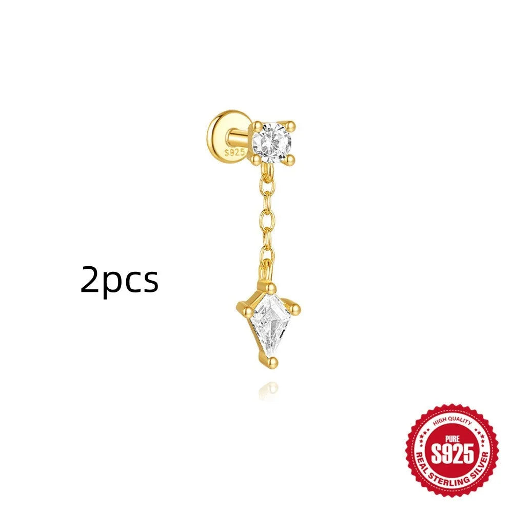 S925 sterling silver geometric kite shaped earrings with chain tassel and rhinestone detailing in gold tone finish