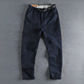 Men's cotton workwear casual pants in khaki and dark blue with three-dimensional cutting and mid waist zipper fly design