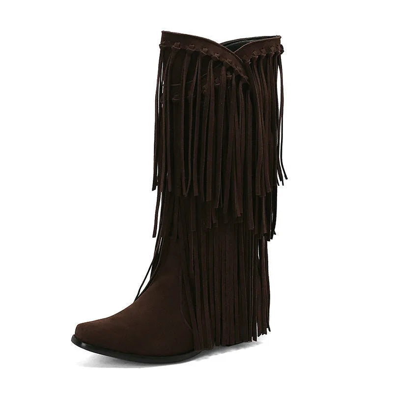 Women's black suede knee-high boots with a chunky heel and tassel decoration.