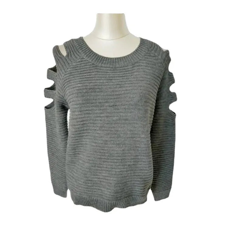 Women's white knitted pullover shirt with a crocheted hollow-out pattern and round neck.