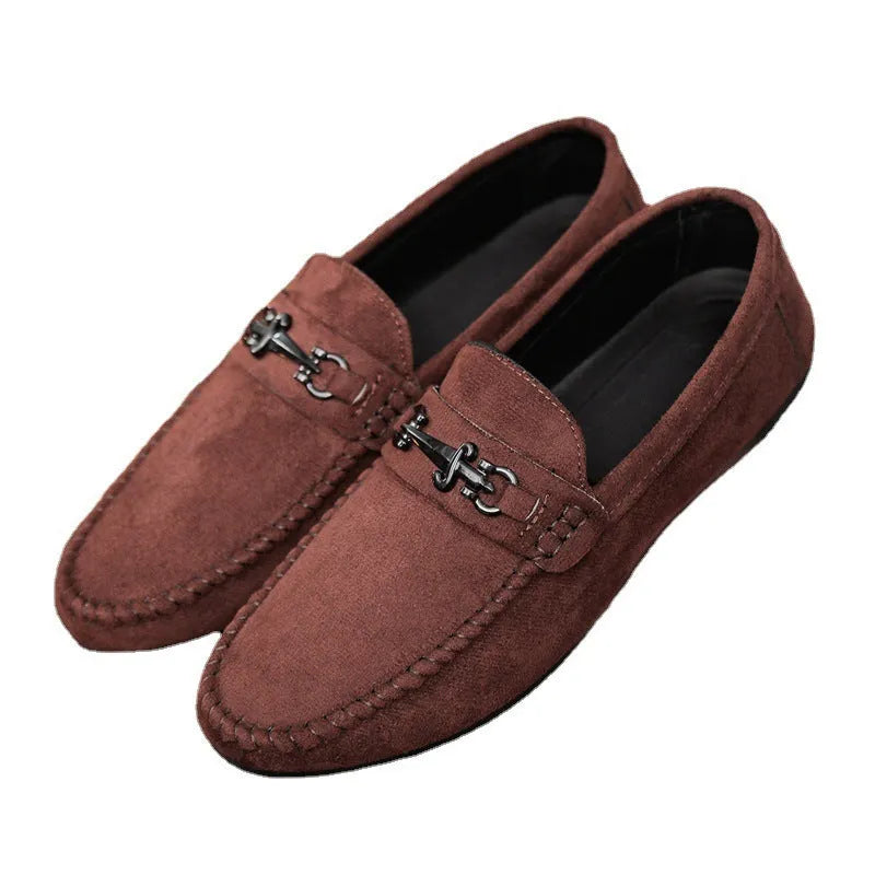 Men's waterproof black slip-on loafers with round toe and low stiletto heel on a rubber sole.