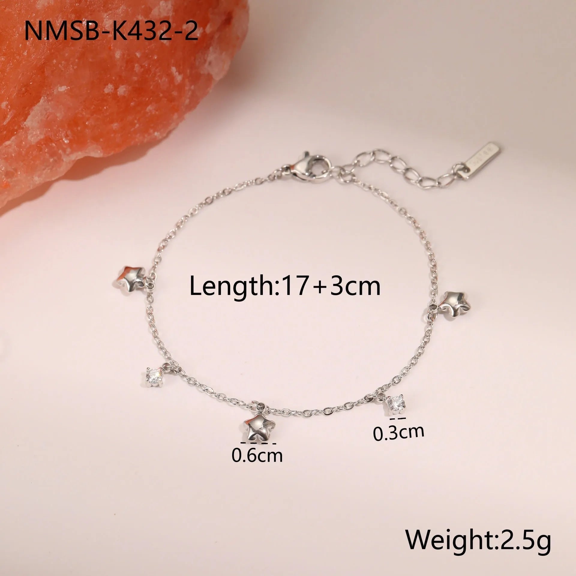 Ins Titanium Steel women's bracelet with 18K gold plating and a geometric zircon star pendant.
