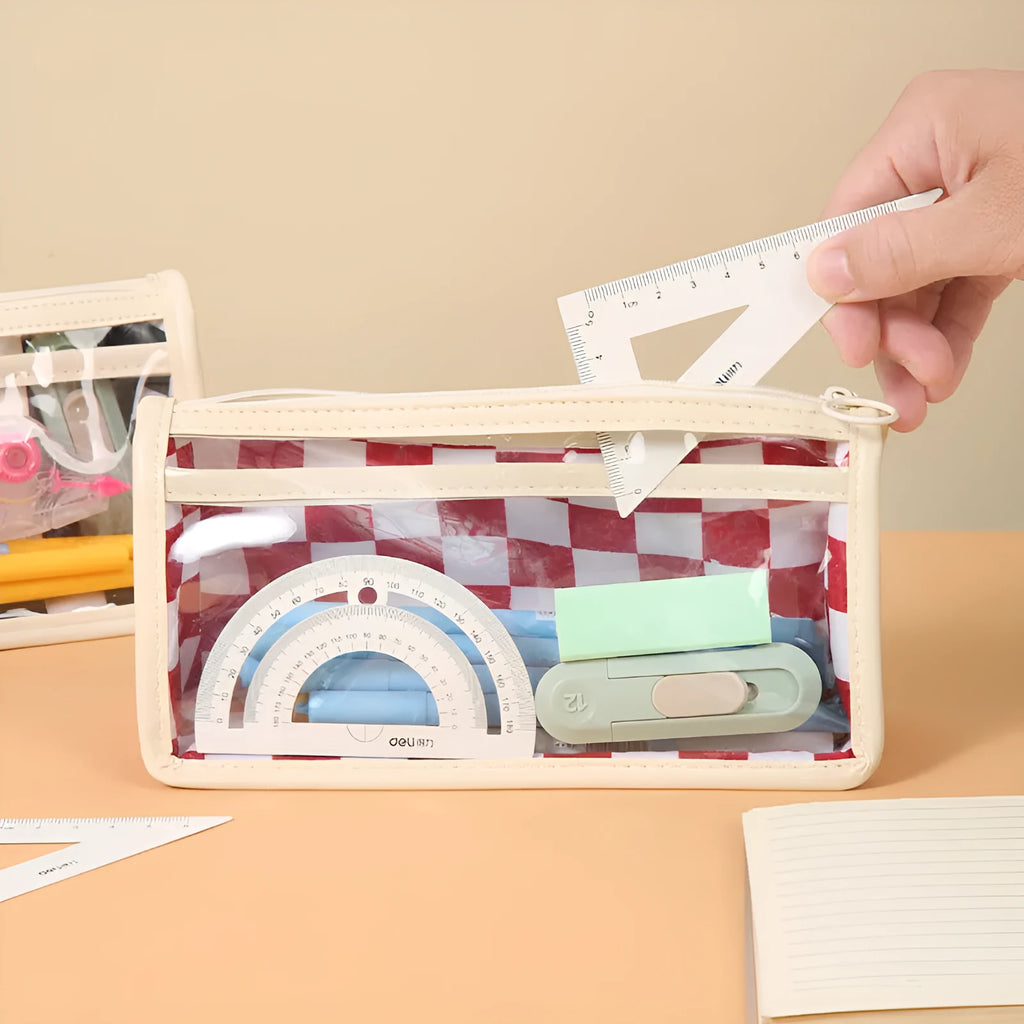 Transparent PVC pencil case with chessboard pattern showing pens inside, black and white grid design