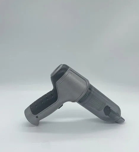 Compact gold or silver wireless car and pet vacuum cleaner with USB charging cable.