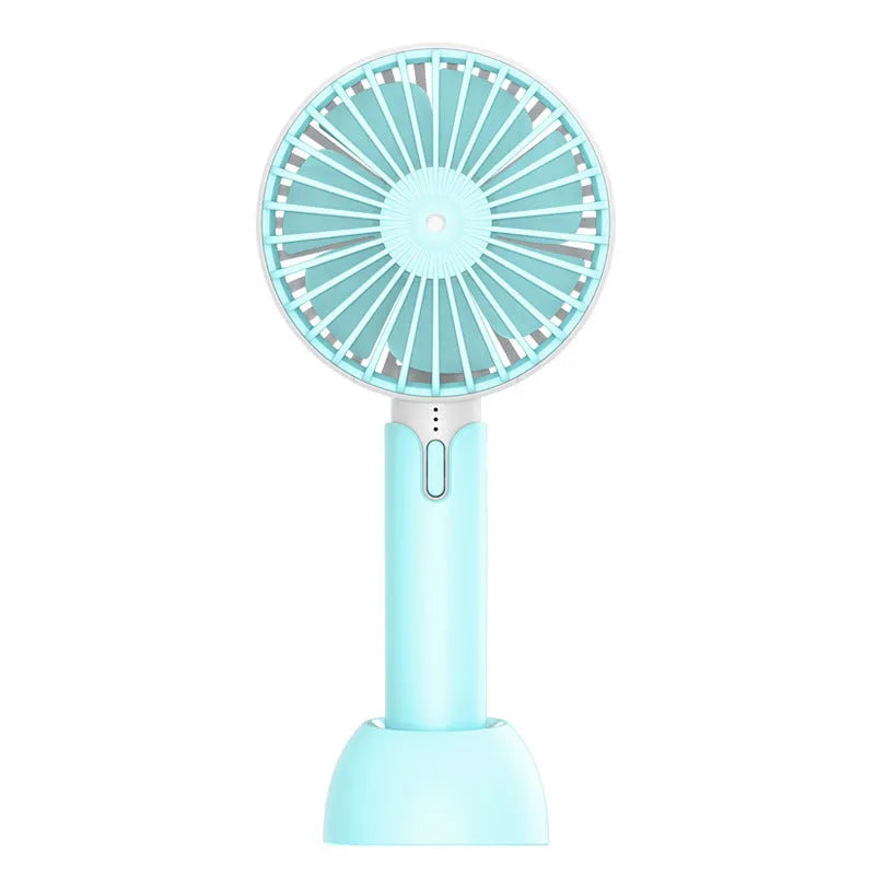 Blue mini handheld and desktop USB electric fan with oscillation on a table