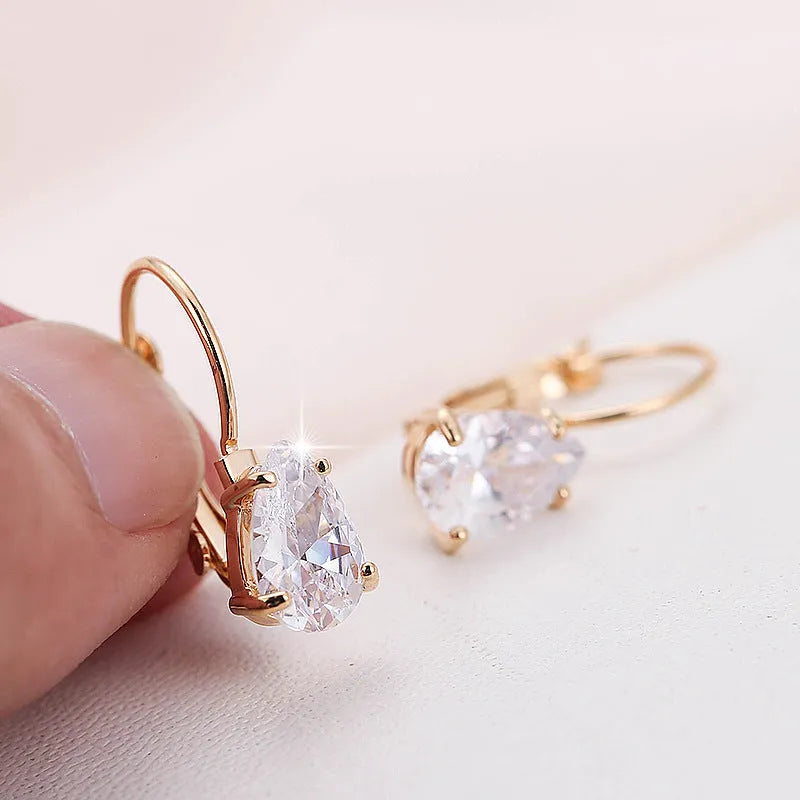Women's drop-shaped copper earrings in gold or platinum colour finishes