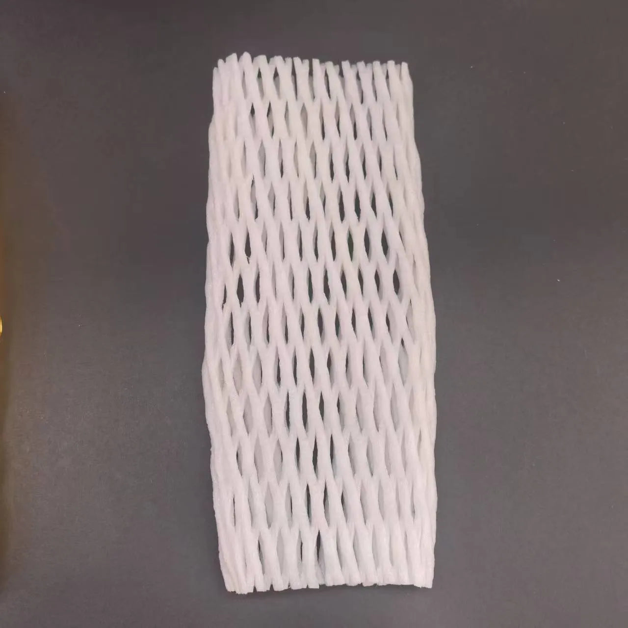 White foam shockproof protective net cover for fruit, shown in various sizes.