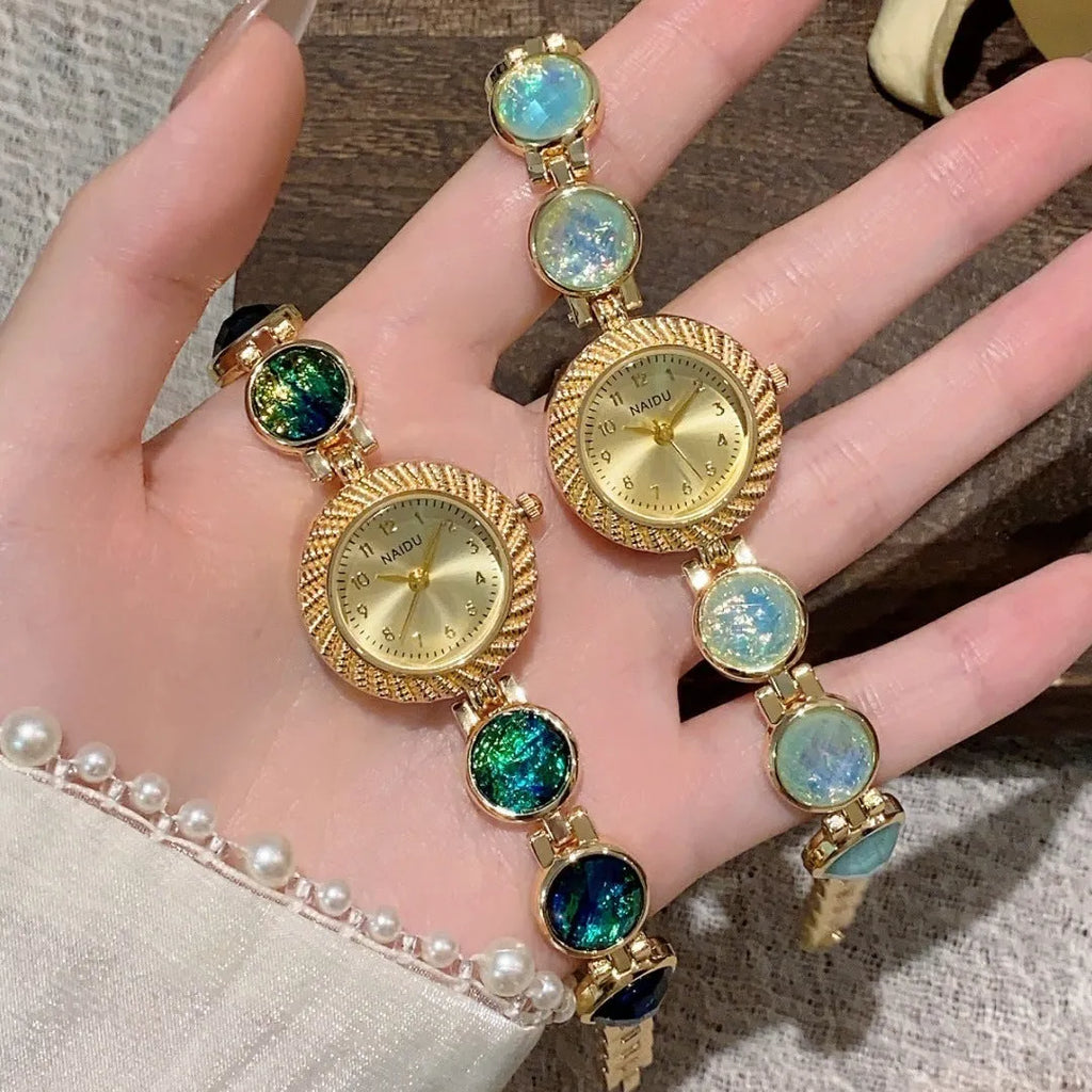 Women's quartz watch with 25mm round dial in one of six colours including milky white and dark green
