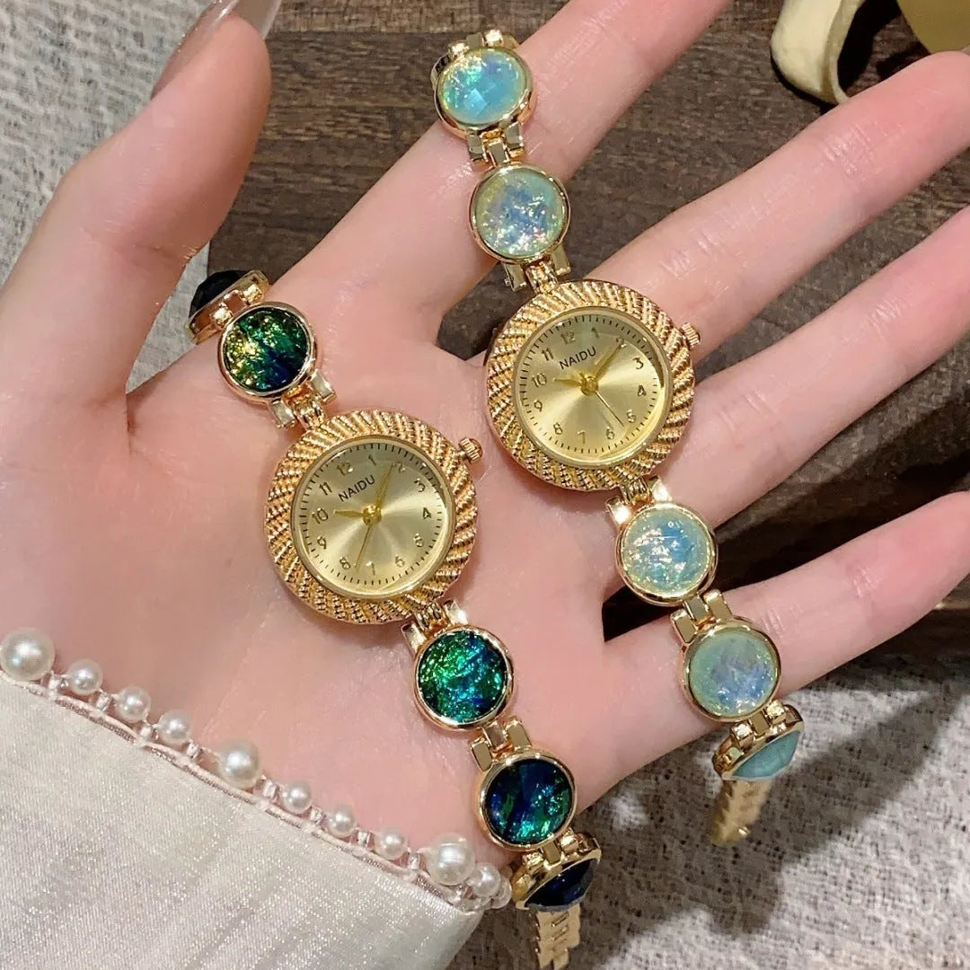Women's quartz watch with 25mm round dial in one of six colours including milky white and dark green