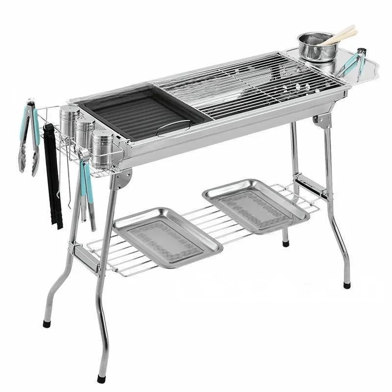 Large stainless steel charcoal barbecue oven with turnover design and cooking accessories