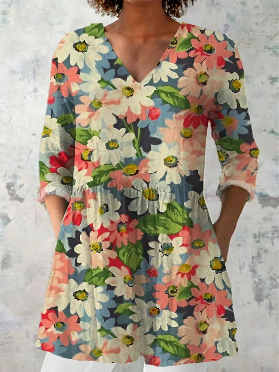 Women's slim-fit retro printed long-sleeved polyester top on a hanger, showing detail of digital print.
