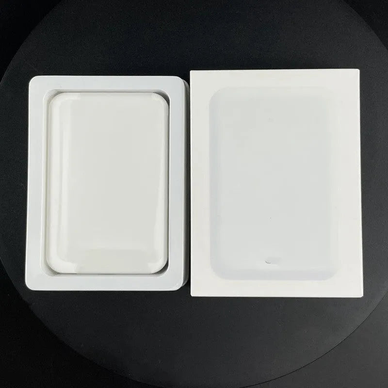 Magnetic wireless charger power bank in white with 5000mAh capacity measuring 100x65x16mm