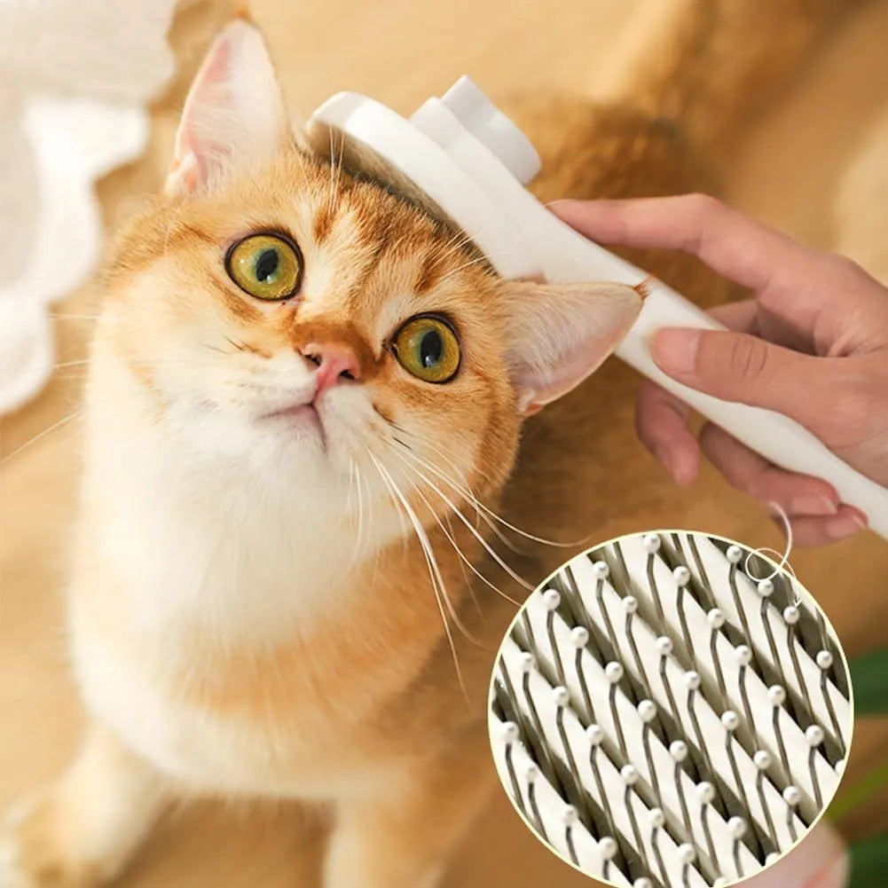 Blue self-cleaning cat brush with rubber handle and metal pins for pet grooming.