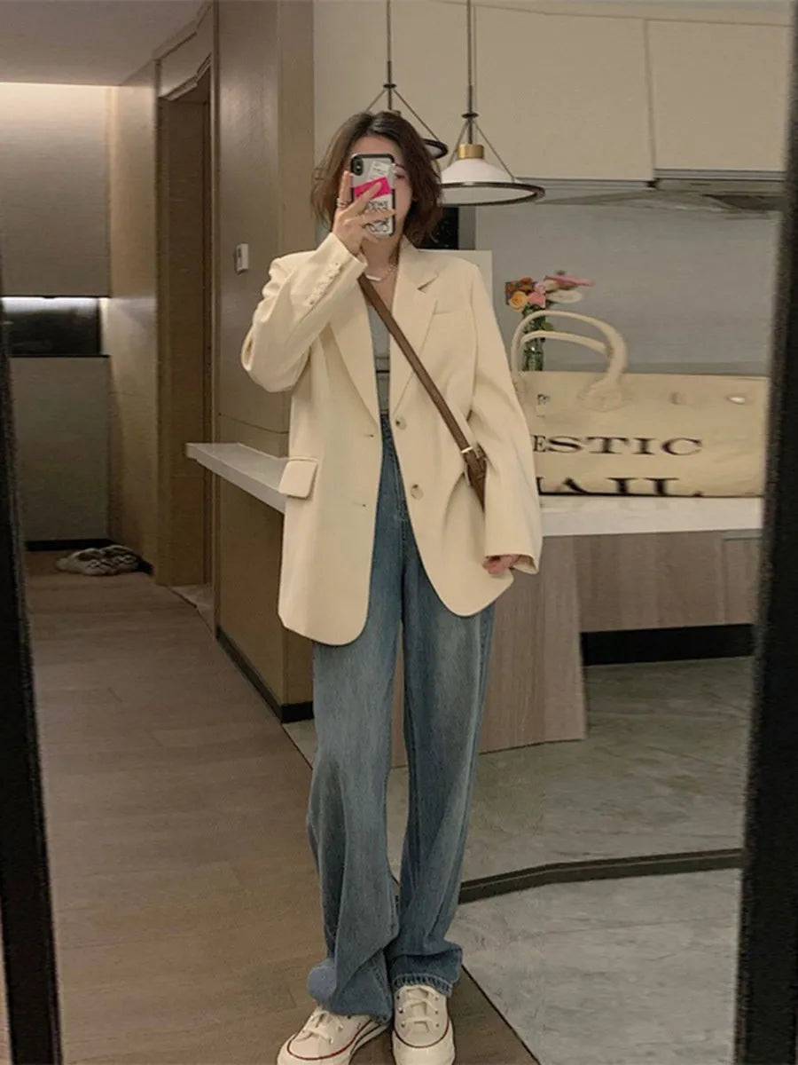 Korean style solid colour polyester blazer jacket with long sleeves and a pocket.