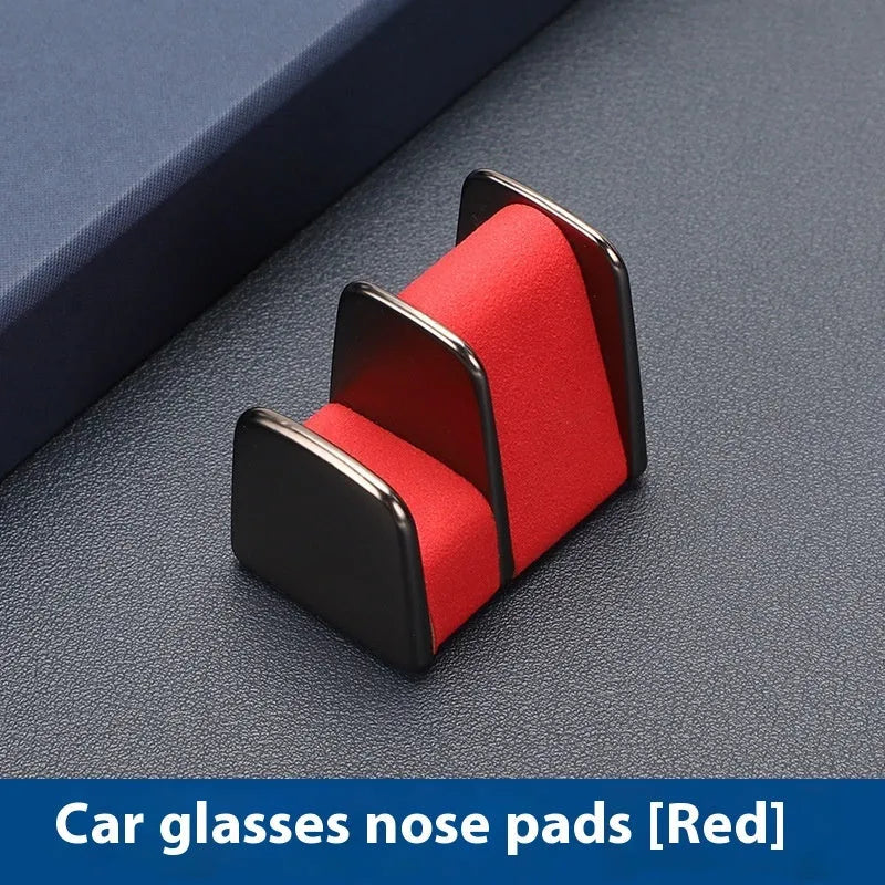 Car dashboard glasses holder clip in leather-covered zinc alloy, showing colour options