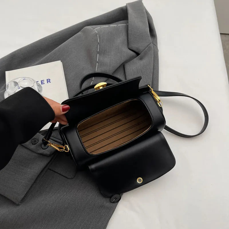 Personalised women's shoulder messenger bag in PU leather with letter detailing, shown in beige colour.