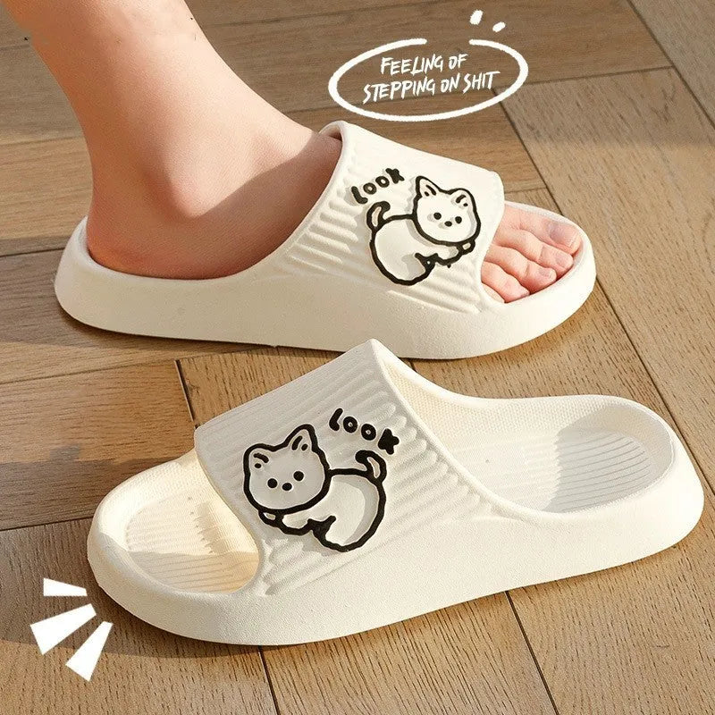 Green EVA cat flip-flop slippers with a thick platform sole on a white background.