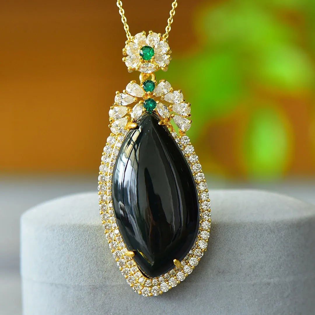 Flat grey Hetian jade pendant with copper wire inlay on an 18-inch chain.