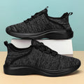 Women's low-top casual sneakers in mesh with lace-up front and EVA sole, shown in black colour.