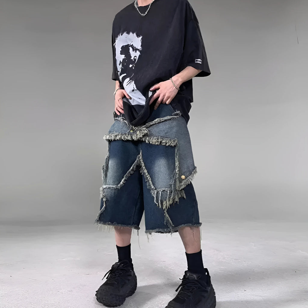 Blue men's denim shorts with a frayed hem and a large five-pointed star design on the leg.