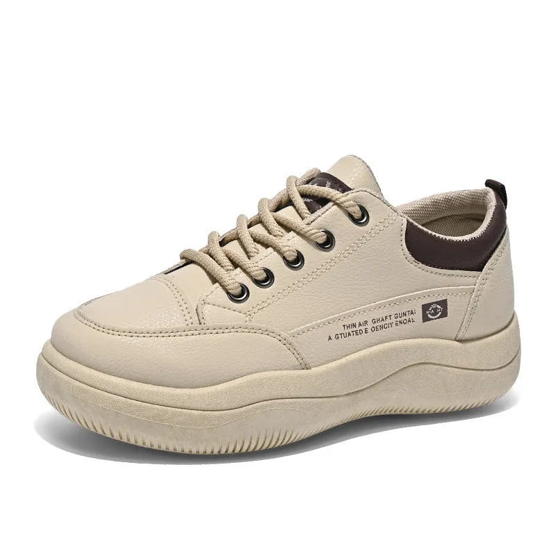 Women's white Korean-style lace-up shoes with cross straps and a mid heel on a rubber sole.