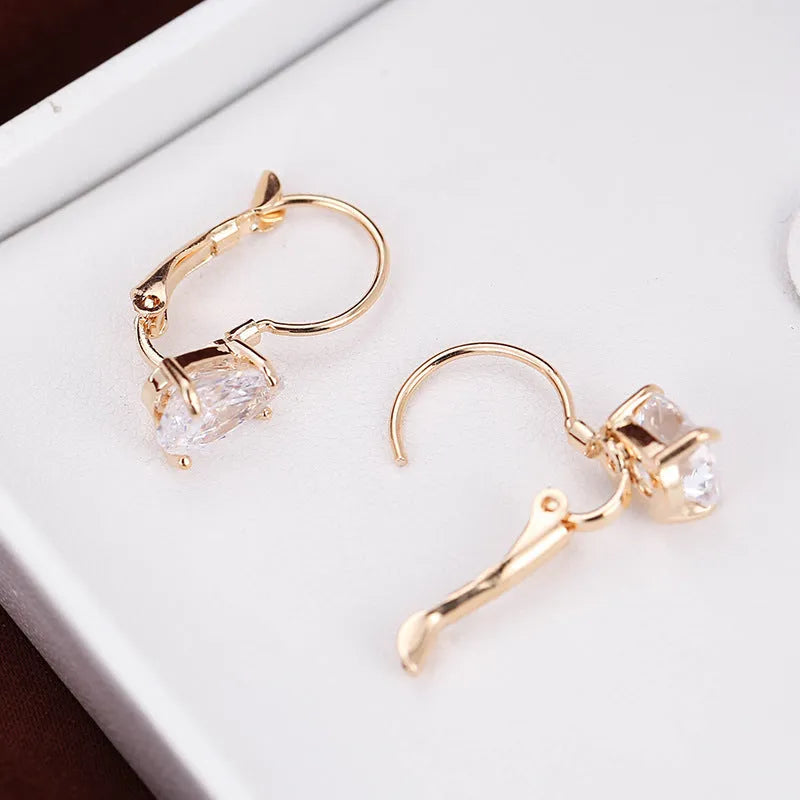 Women's drop-shaped copper earrings in gold or platinum colour finishes