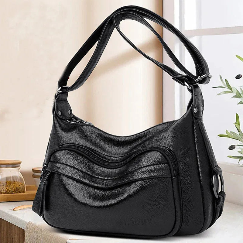 Large blue or black horizontal square women's PU shoulder bag with a zipper and soft handle.
