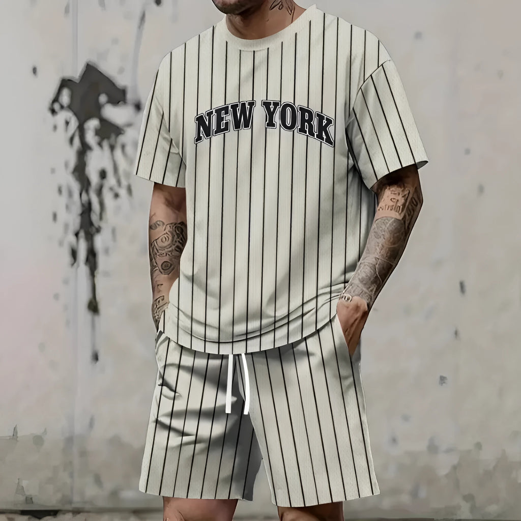 Men's grey 3D printed letter sports suit comprising a short sleeve top and matching shorts