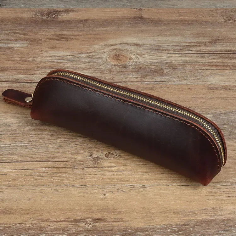 Handmade square leather pencil and glasses case with zipper, shown in black colour.