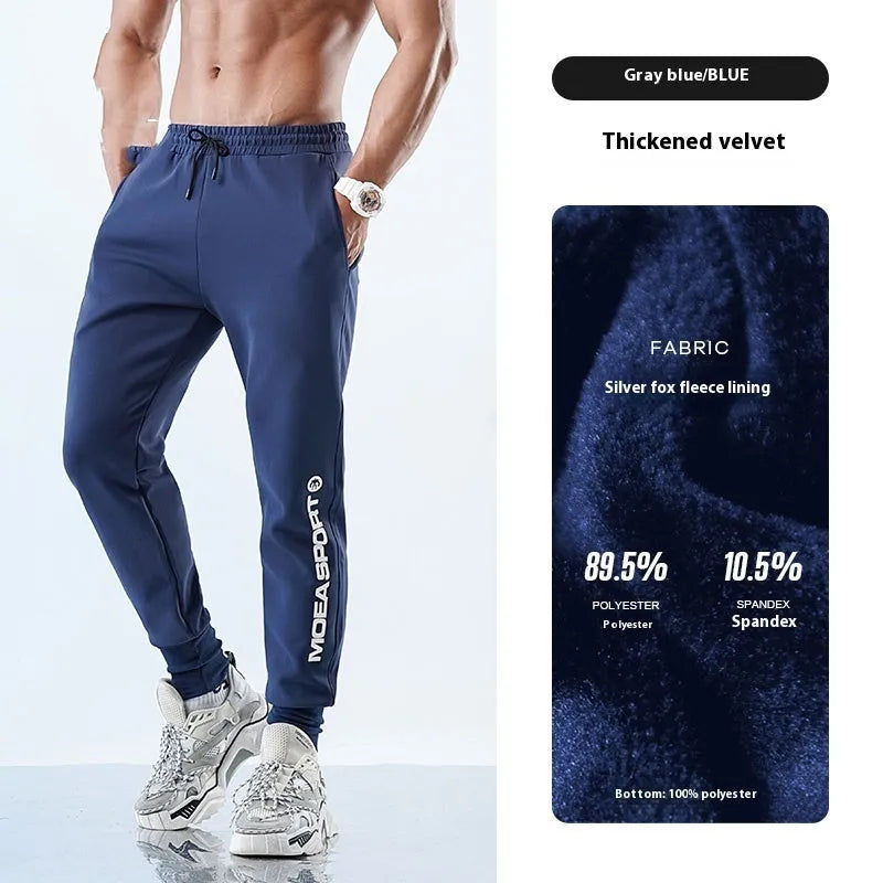 Men's black air layer ankle-tied sweatpants with mid waist design shown laid flat