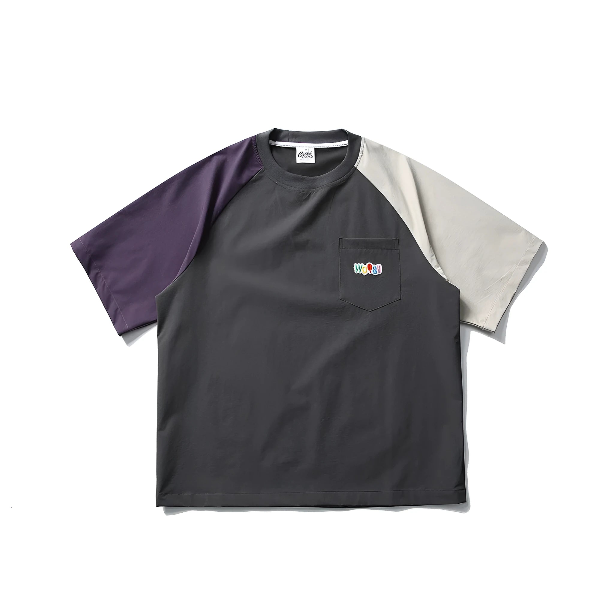 Dark grey loose-fit t-shirt with contrast colour raglan short sleeves on a hanger.