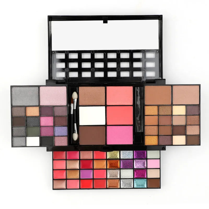 74 colour makeup palette open showing eyeshadows, lip glosses, concealers, blushes, and contour powders with included brushes