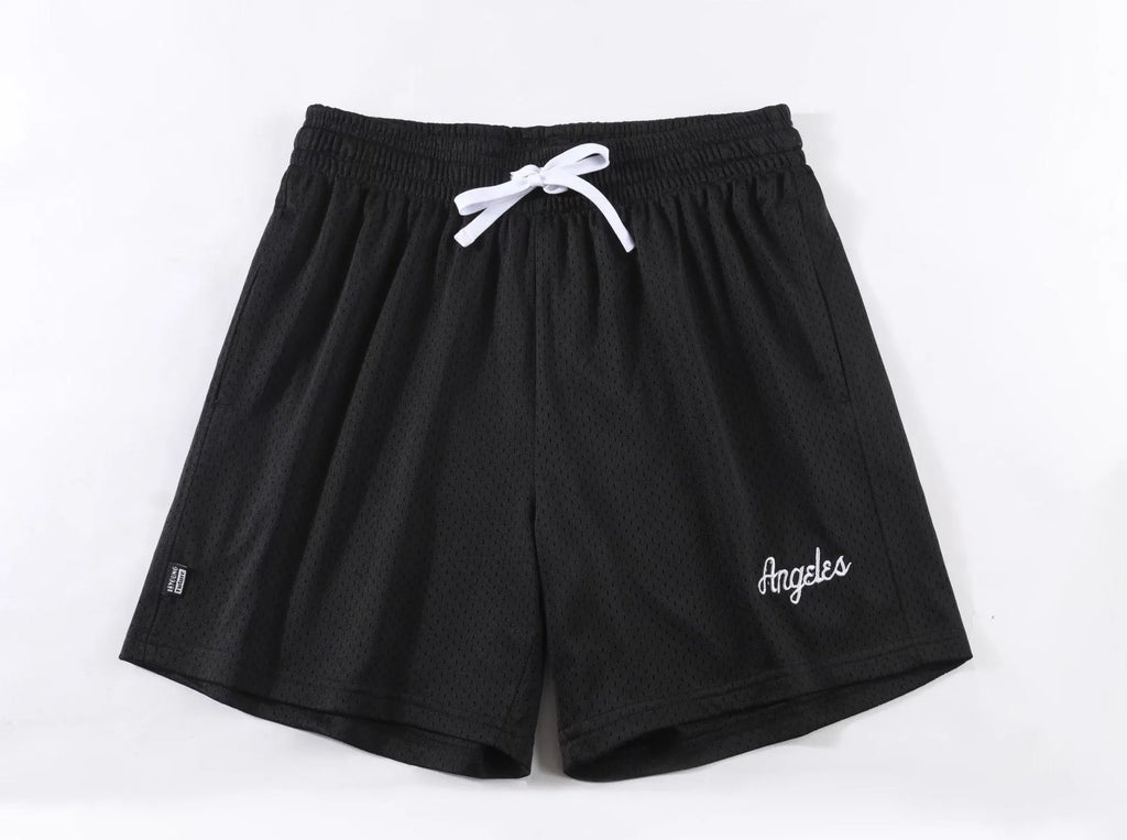Men's black double-layer mesh shorts laid flat, showing sports and leisure style.