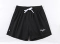 Men's black double-layer mesh shorts laid flat, showing sports and leisure style.