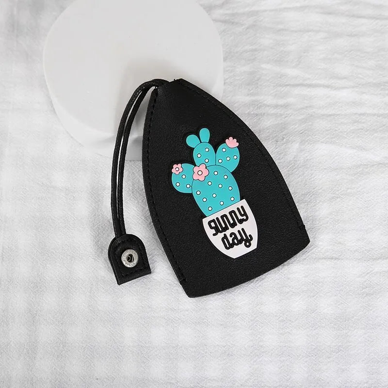 Cartoon design pull-out car key case made from soft PU leather, showing approximate size.