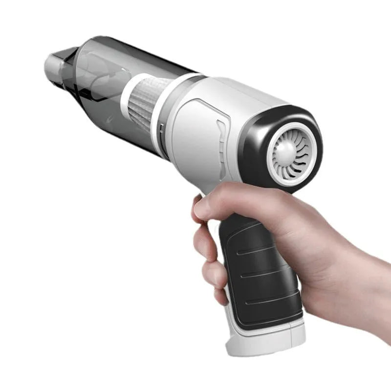 Compact gold or silver wireless car and pet vacuum cleaner with USB charging cable.