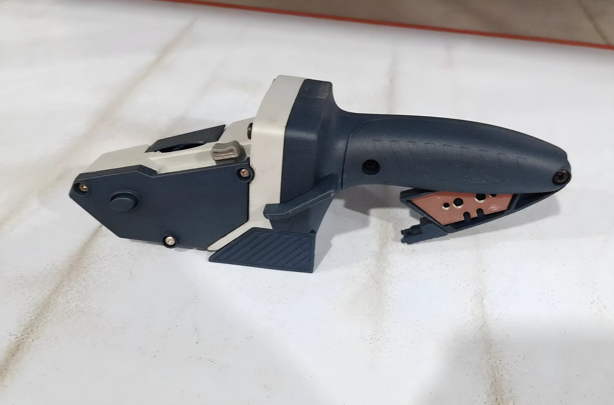 Blue multifunctional woodworking cutter with measurement scale and one-press lock mechanism