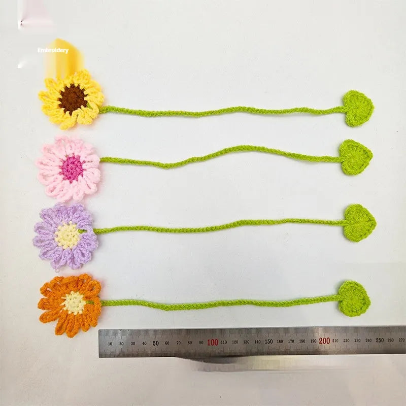 Hand-crocheted wool daisy bookmark with flexible wire core in multiple colour options