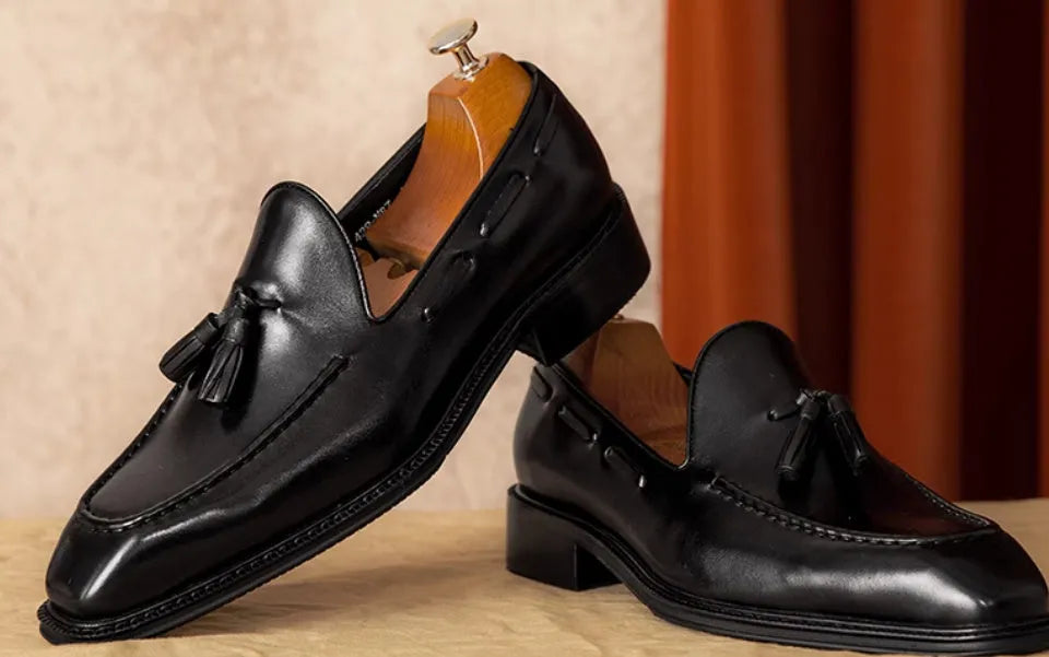 Men's black and brown genuine leather slip-on loafers with pigskin lining and rubber sole