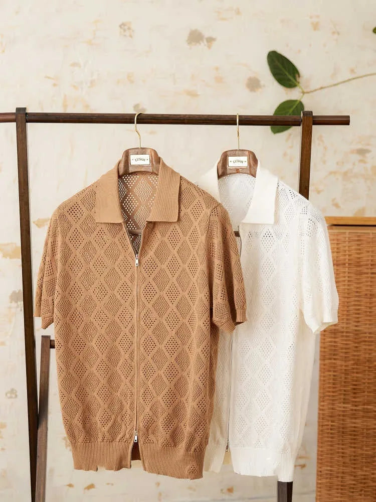 Light brown short sleeve zip-up cardigan with a lapel collar laid flat.