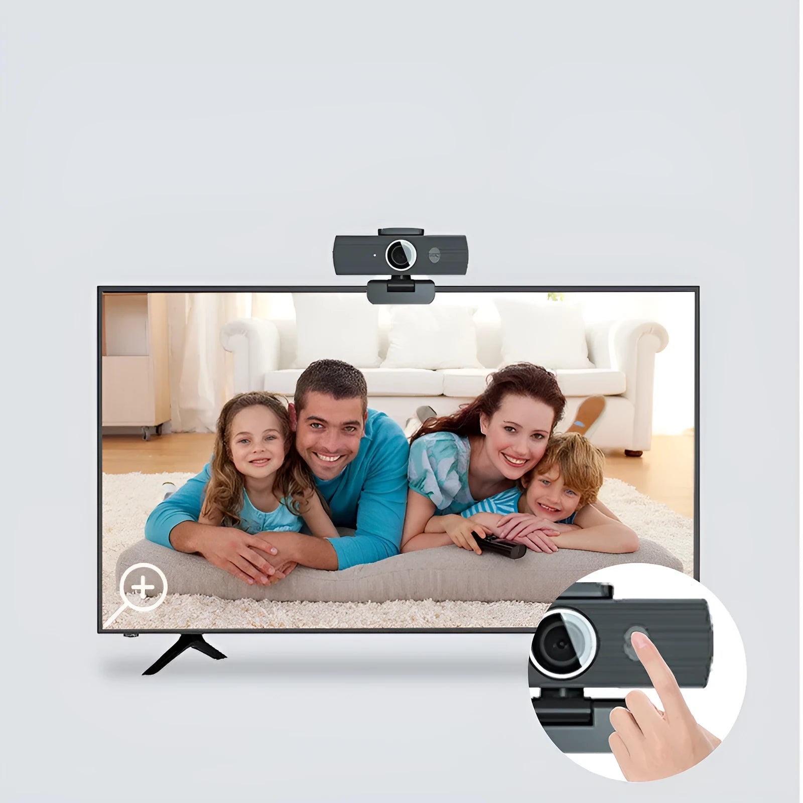 Black USB webcam with attached cable and a magnetic privacy cover on a desk.