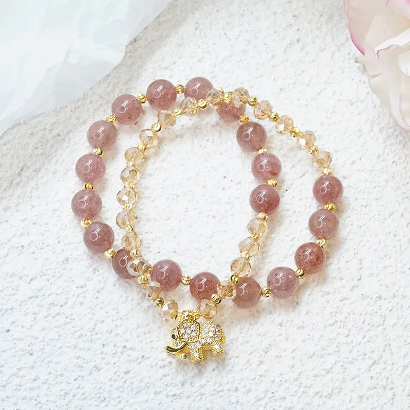 Women's retro bracelet in colour hair crystal or strawberry quartz with ethnic design elements