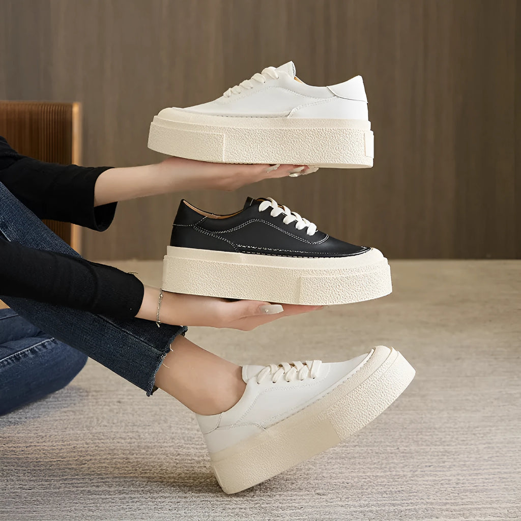 Women's black platform casual sports shoes with embossed cowhide upper and round toe design