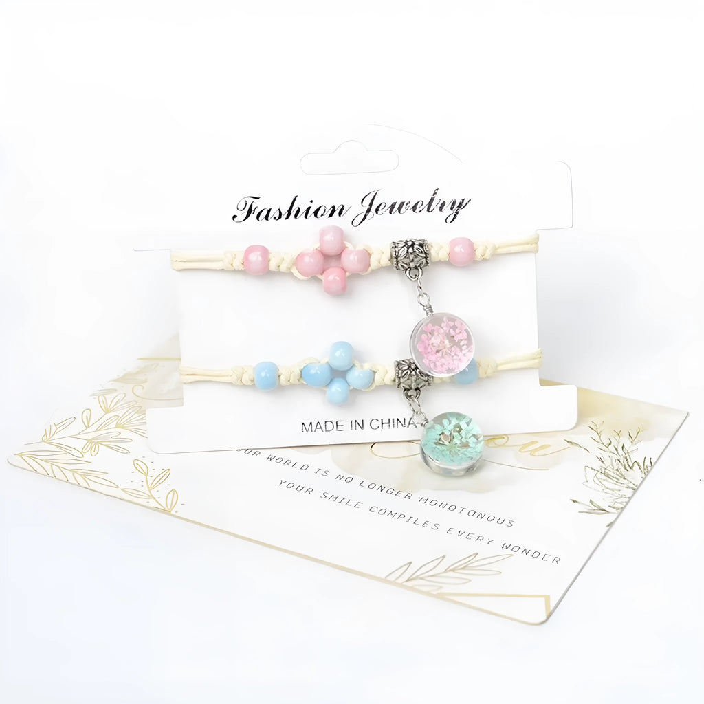 Glass dried flower bracelet with large 1.4 cm beads containing real preserved flowers in hand-woven lace design