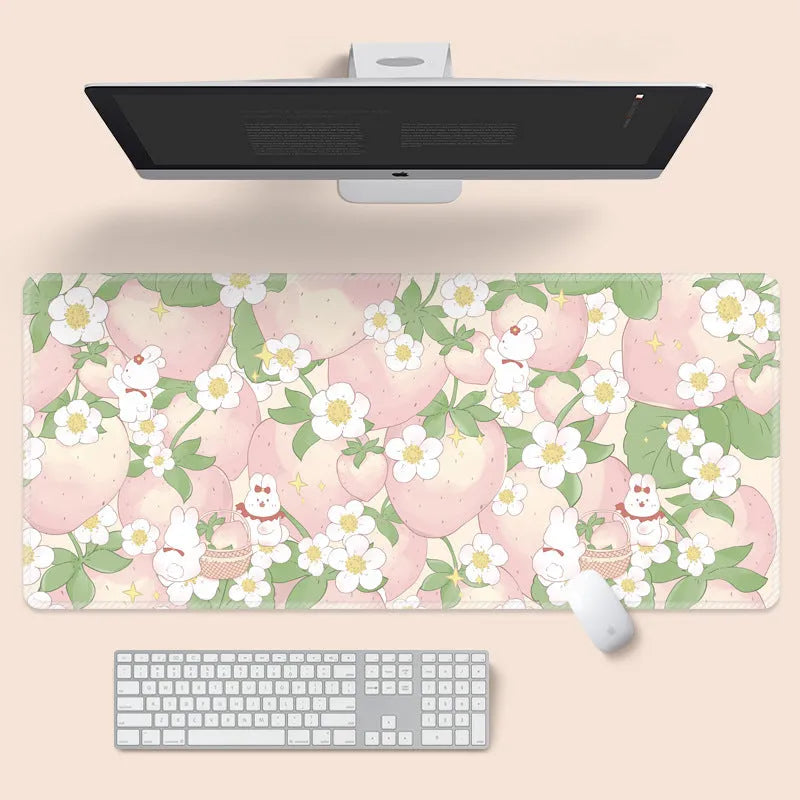Large floral cartoon pattern mouse pad on a desk, showing non-slip rubber base and colourful design.
